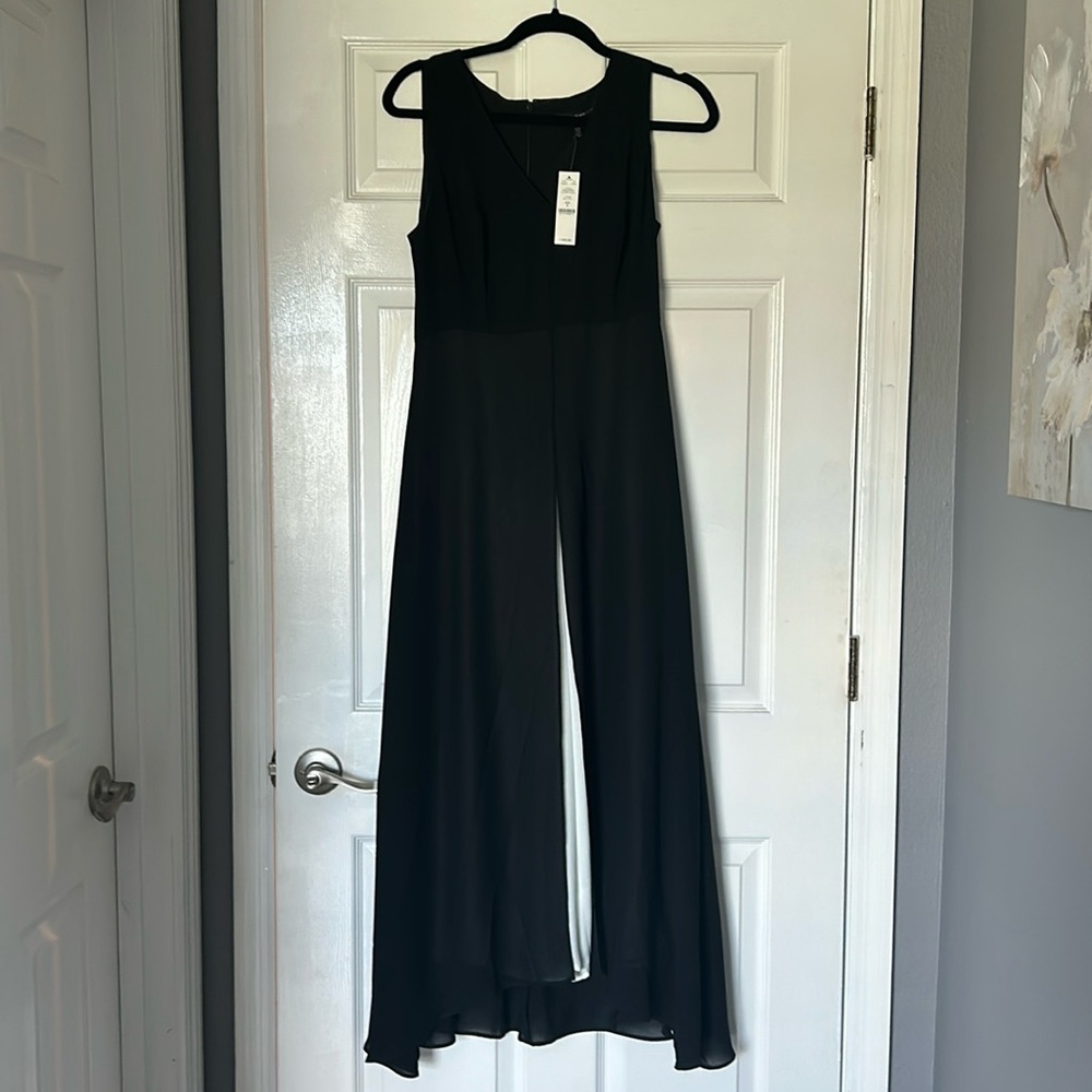 NEW White House Black Market Sleeveless
Overlay Jumpsuit new with tags!